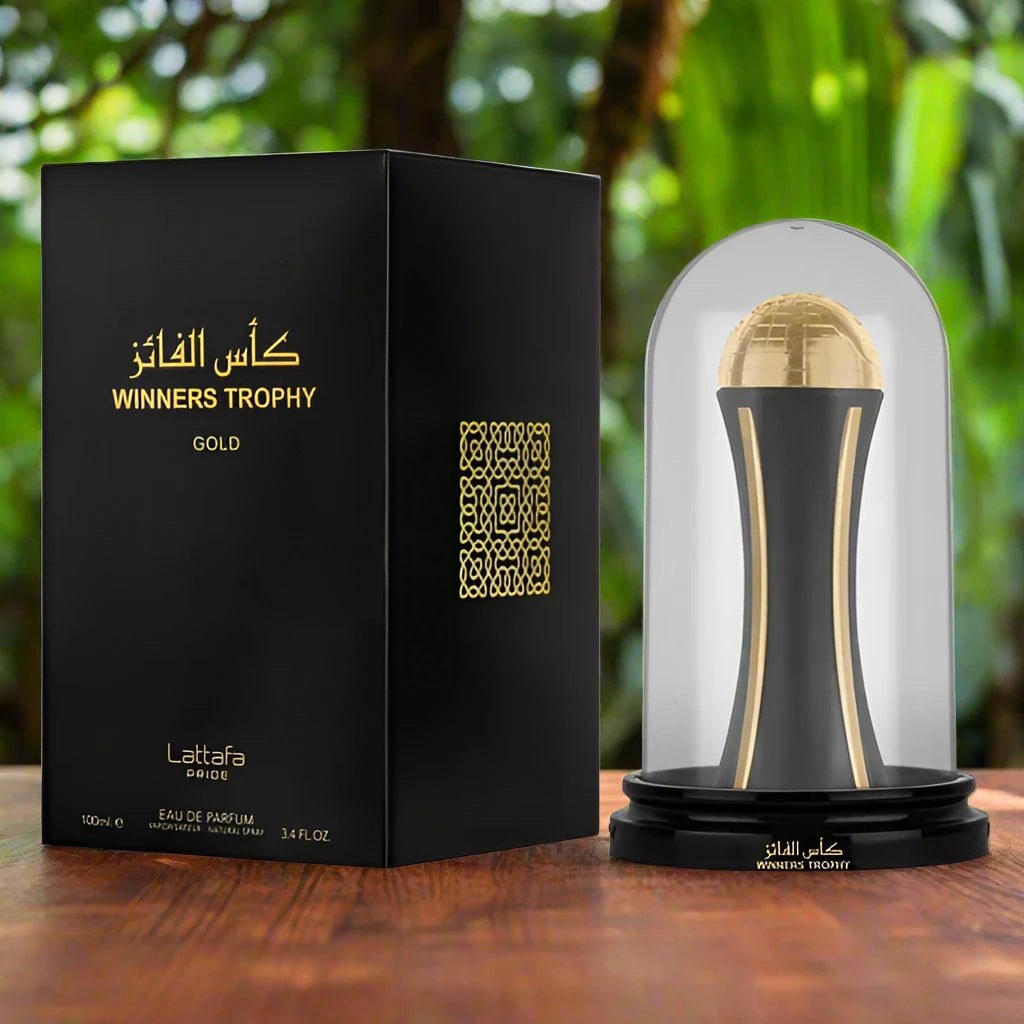 A sleek, transparent perfume bottle with a gold cap, labeled 'Jasmine Essence,' surrounded by white jasmine flowers