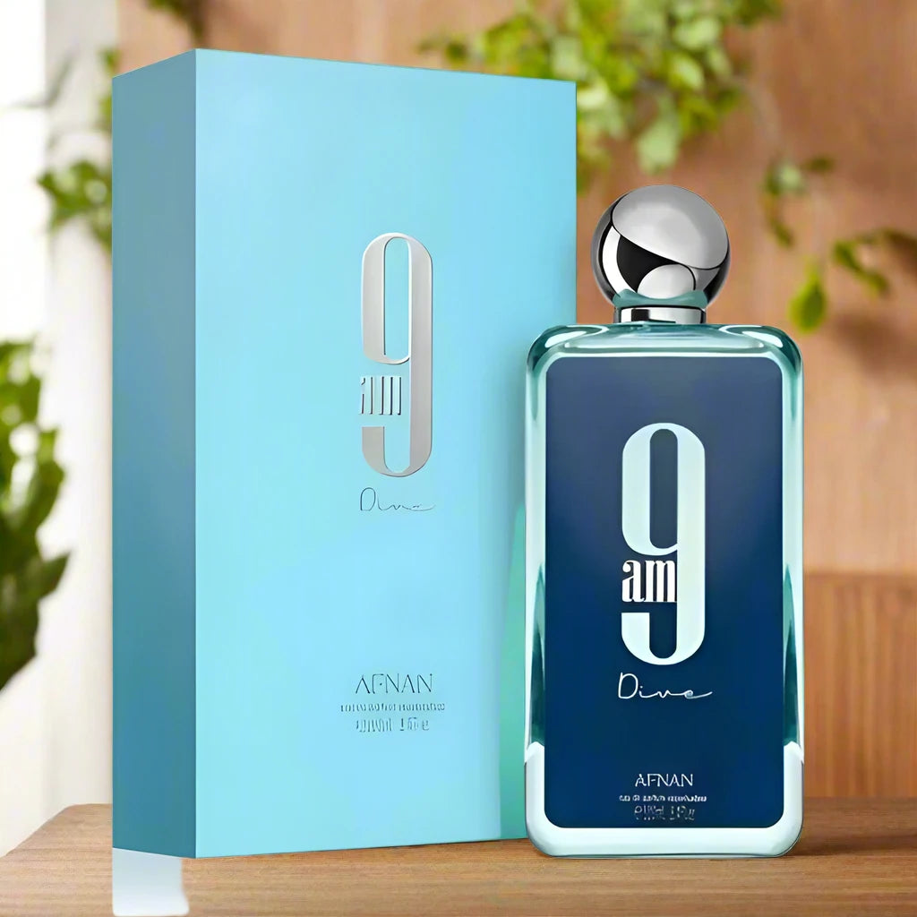 9AM Dive Perfume 100ml by Afnan, set against a tranquil beach, reflecting its fresh and aquatic vibe.
